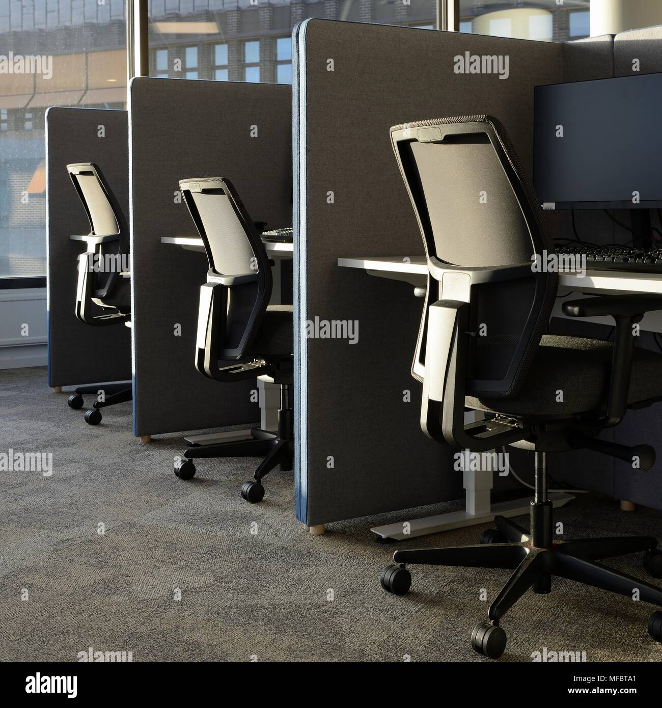 Empty office chairs in a row Stock Photo