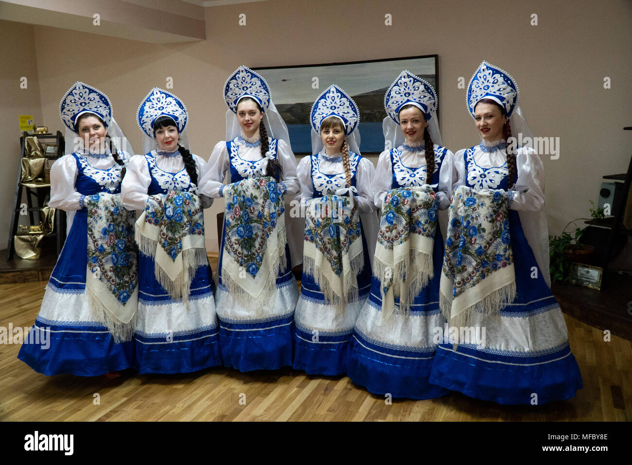 Russian women in traditional costumes in the Russian coal mining settlement of Barentsburg, Spitsbergen Stock Photo
