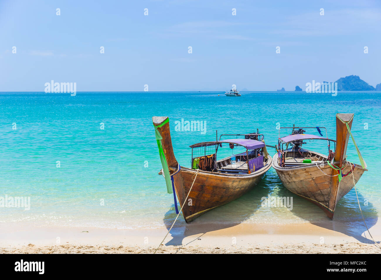 Thailand Andaman Sea Travel with Long tail boats on Tropical beach Summer Holiday Stock Photo