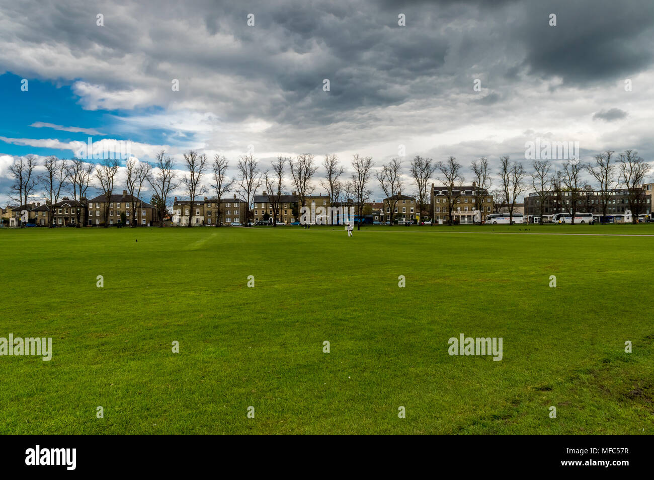 Parker's piece is large park in Cambridge, Cambridgeshire, England, United Kingdom under the evening sky with clouds Stock Photo