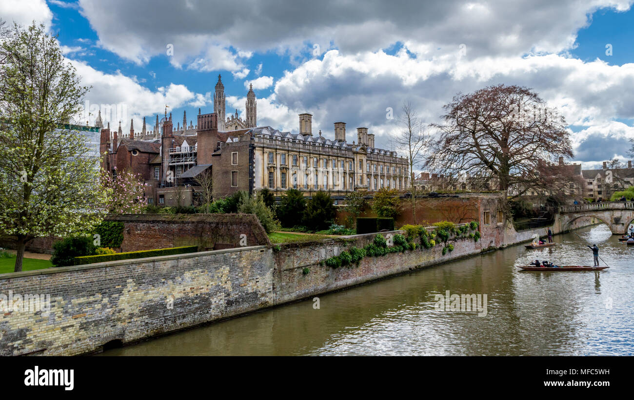 Cambridge, United Kingdom - Apr 17, 2016 : People punting on the river Cam with Clare College and Clare Bridge in background Stock Photo