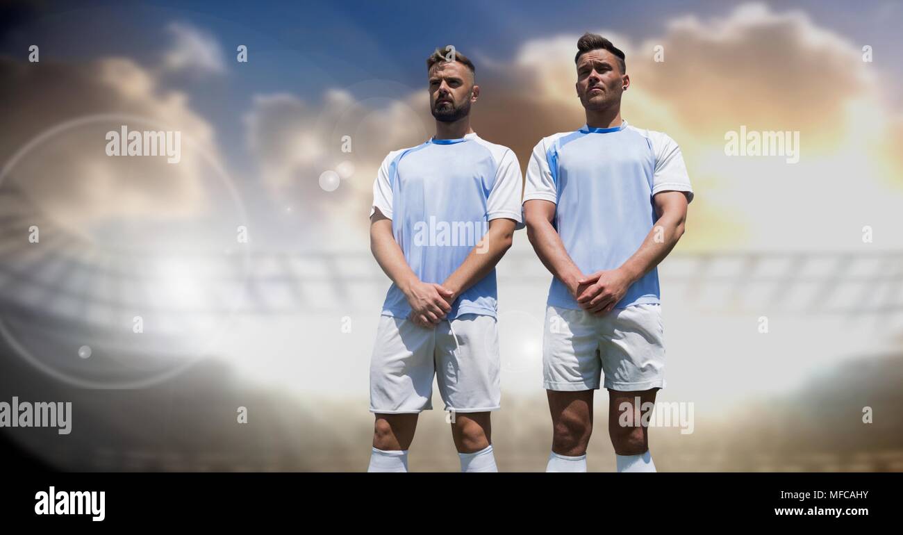 Soccer players in stadium with sky Stock Photo