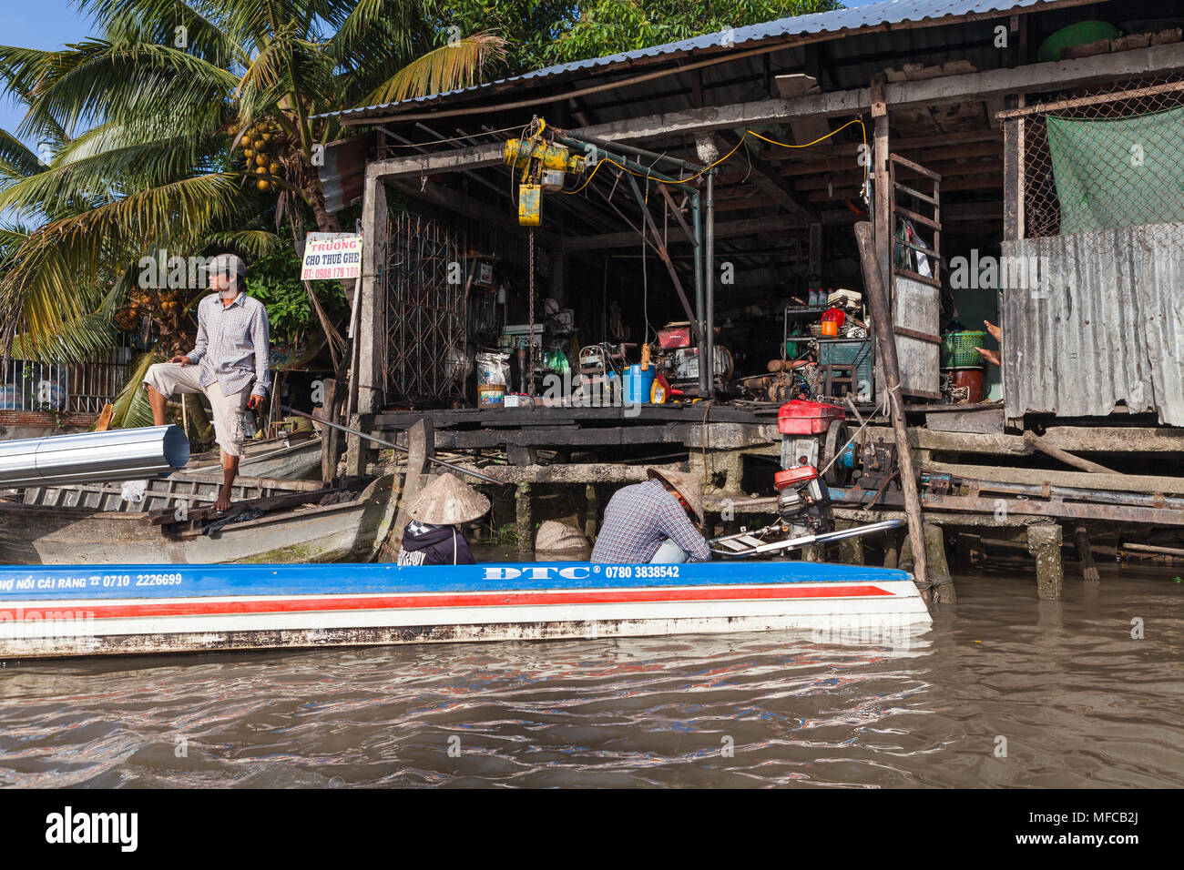 Can Tho, Vietnam - march 19 2017: boat repair workshop on the Mekong delta river Stock Photo