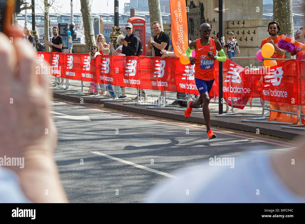 LONDON, GREAT BRITAIN, April 22, 2018 : British runner Mo Farah runs on 3rd place. The 2018 London Marathon was the 38th annual mass participation Lon Stock Photo