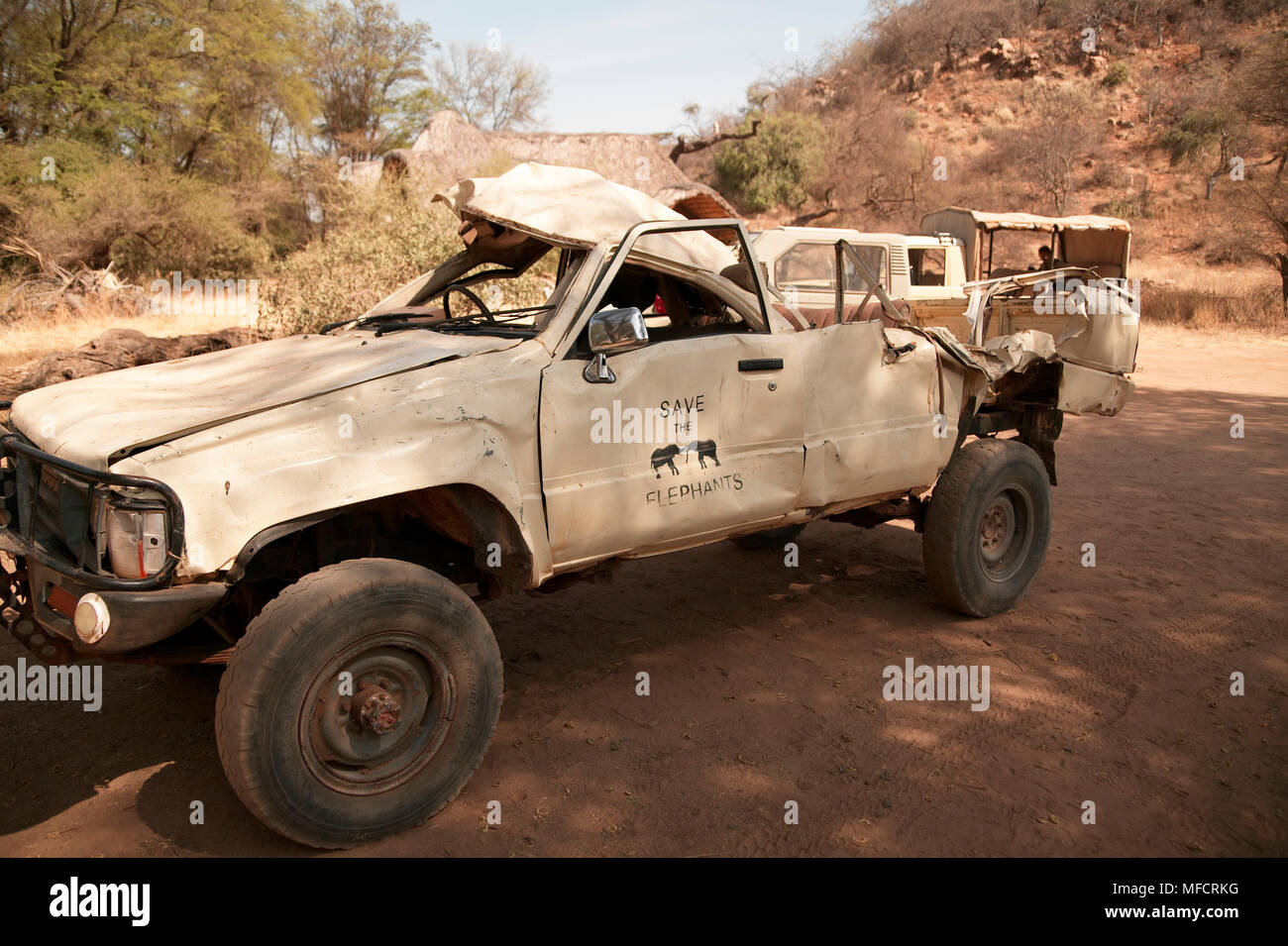 CRUSHED RESEARCH VEHICLE  damaged by aggressive African Elephant Samburu National Park, Kenya Stock Photo