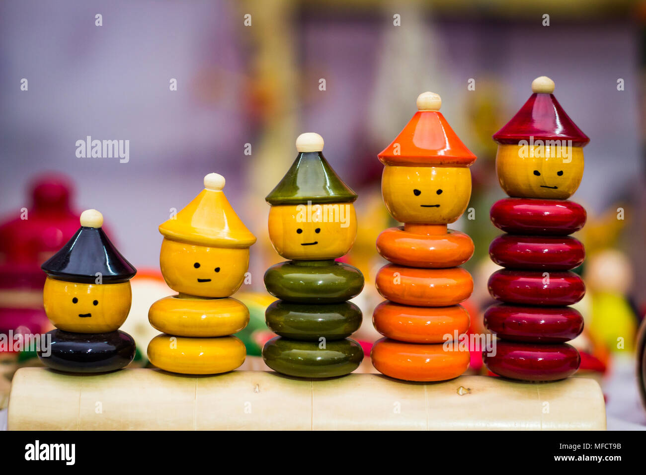 colourful ring toy stacking doll figures with increasing sizes Stock ...