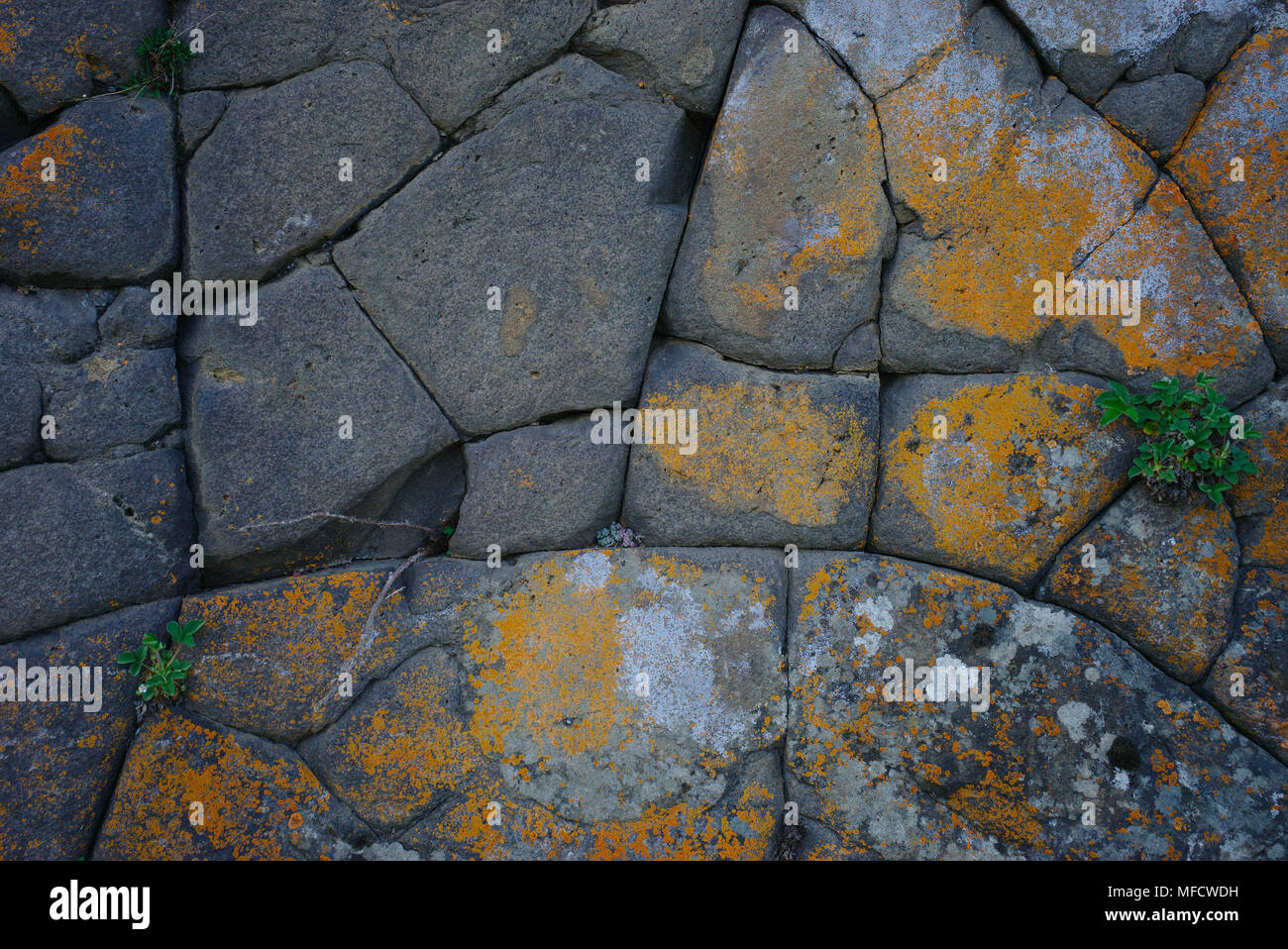 natural stone wall, geological phenomenon Stock Photo