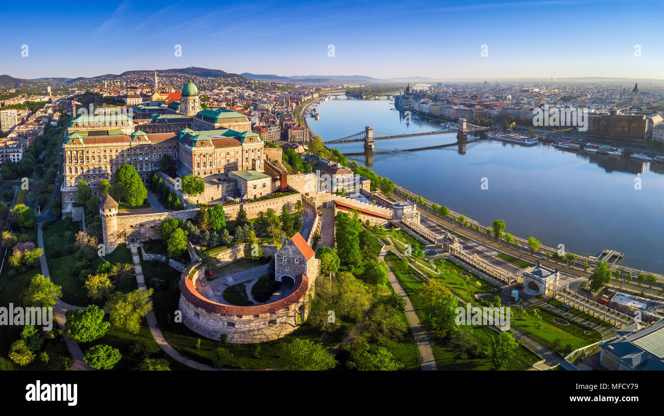 Budapest, Hungary - Aerial panoramic skyline view of Buda Castle Royal Palace with Szechenyi Chain Bridge, St.Stephen's Basilica, Hungarian Parliament Stock Photo