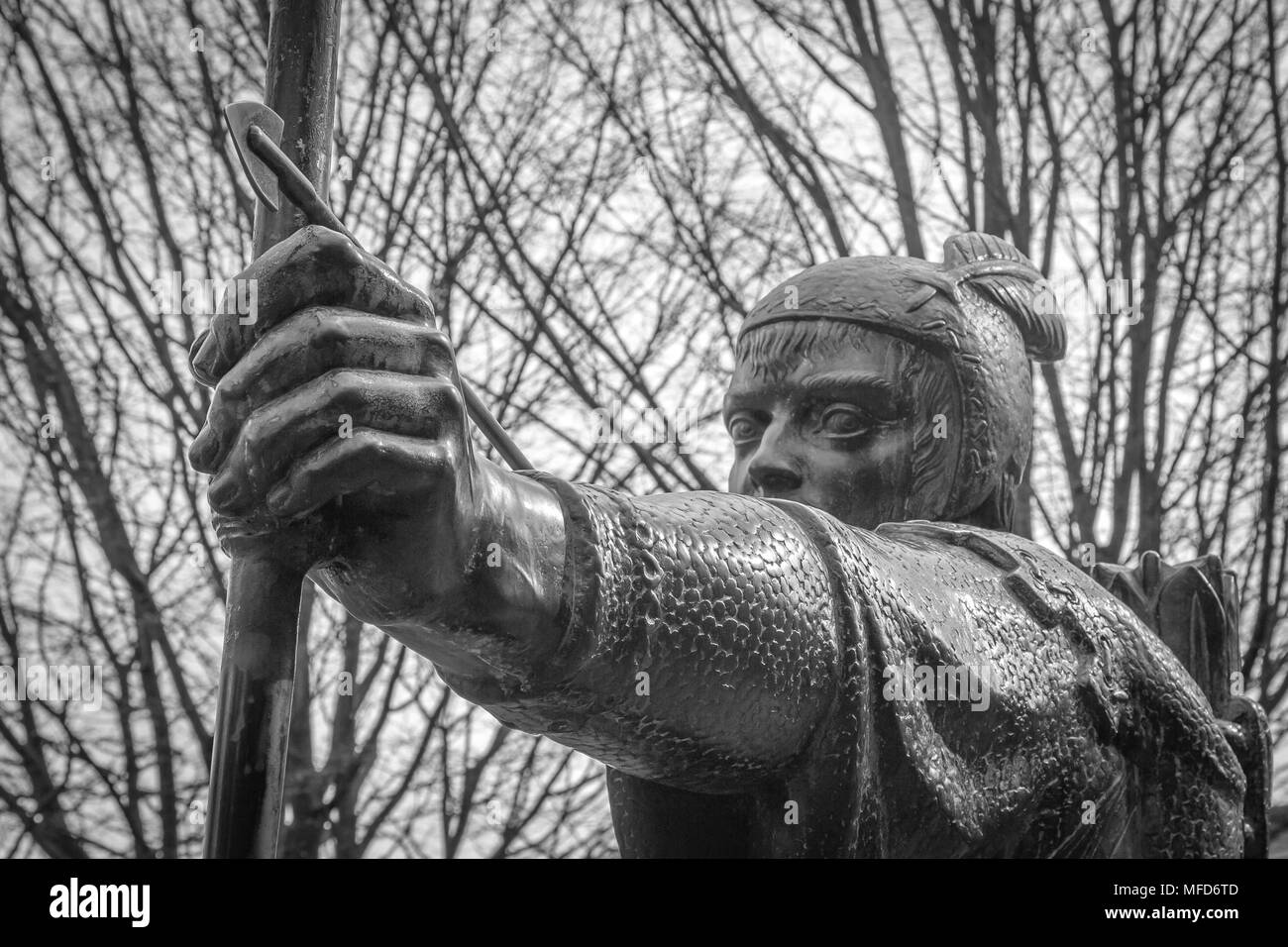 Robin Hood Statue situated on the Robin Hood Lawn, beneath Nottingham Castle, in the remains of the moat on Castle Road Stock Photo