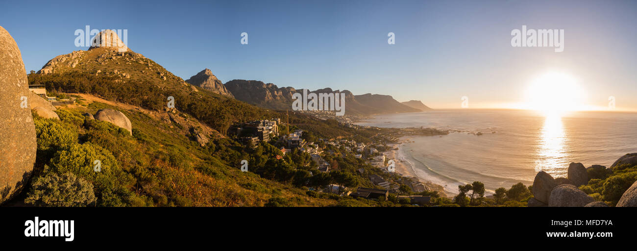 View of Lions Head and the Twelve Apostles at sunset in Cape Town Stock Photo