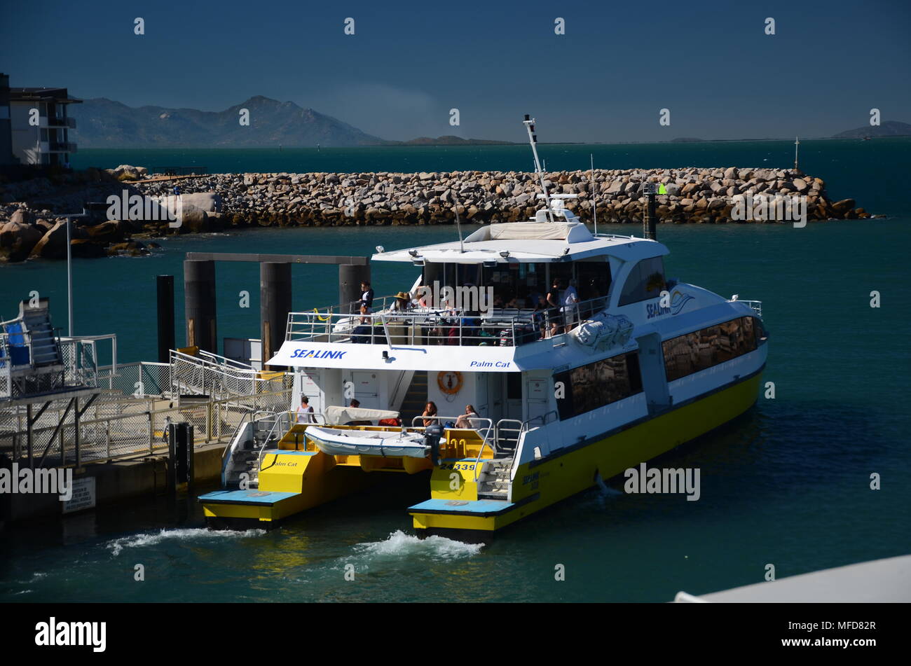 Nelly Bay marina, island Stock Photo Alamy