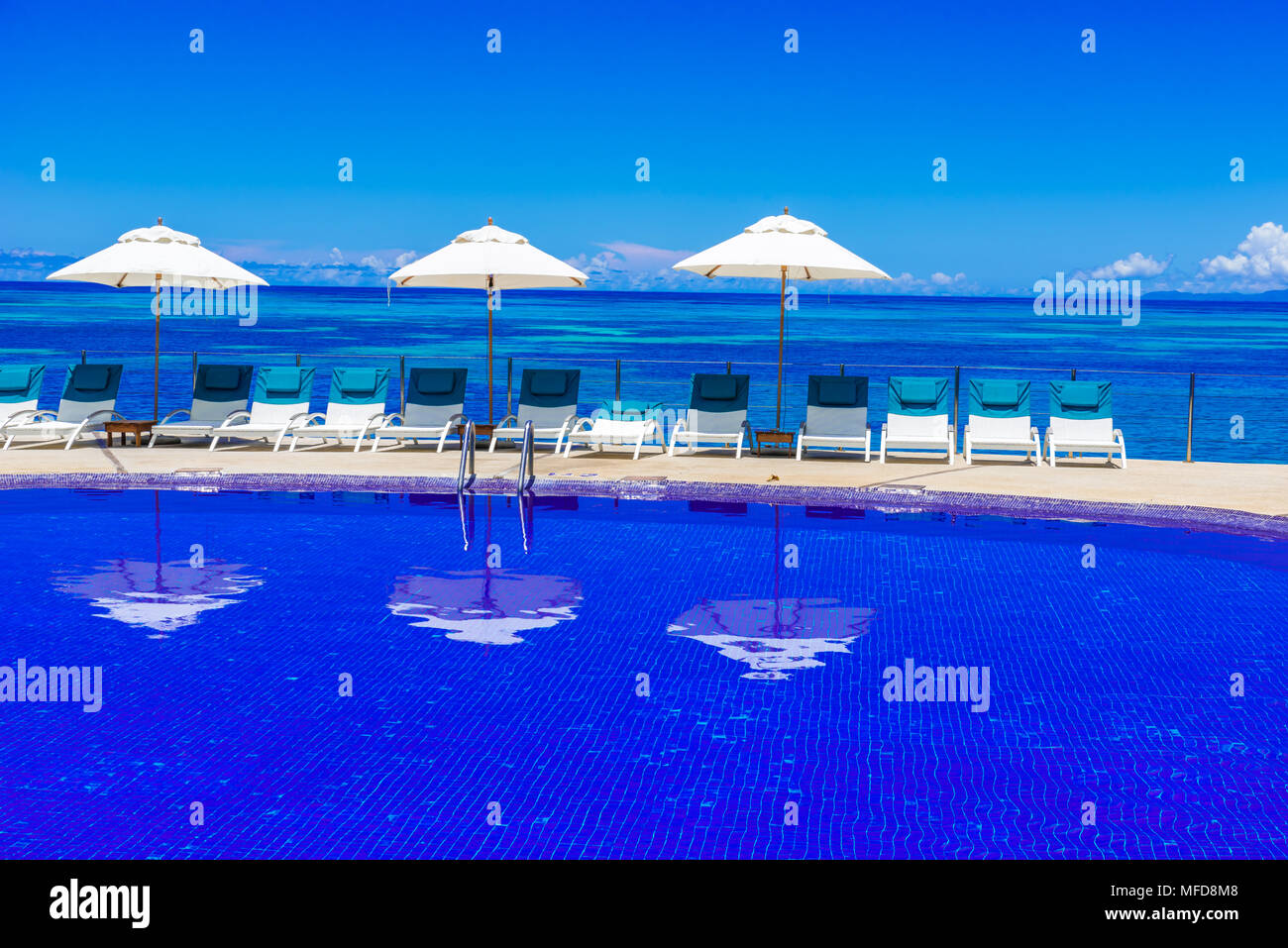 Sunbed on tropical beach Stock Photo Alamy