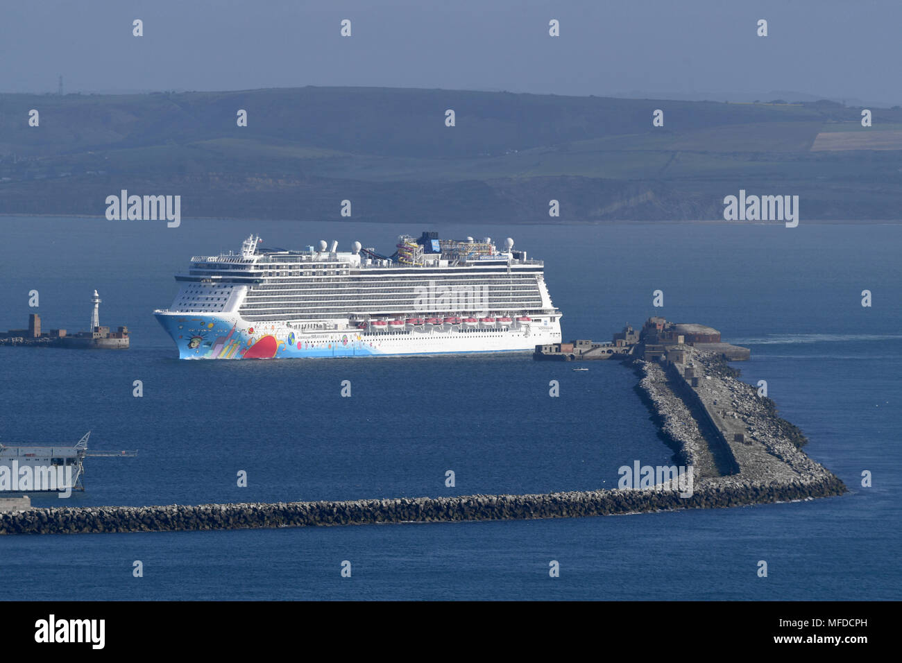 Norwegian Breakaway cruise ship enters Portland Port, at 145,655 GT, it is the longest and heaviest vessel to ever dock at Portland Port. Credit: Finnbarr Webster/Alamy Live News Stock Photo