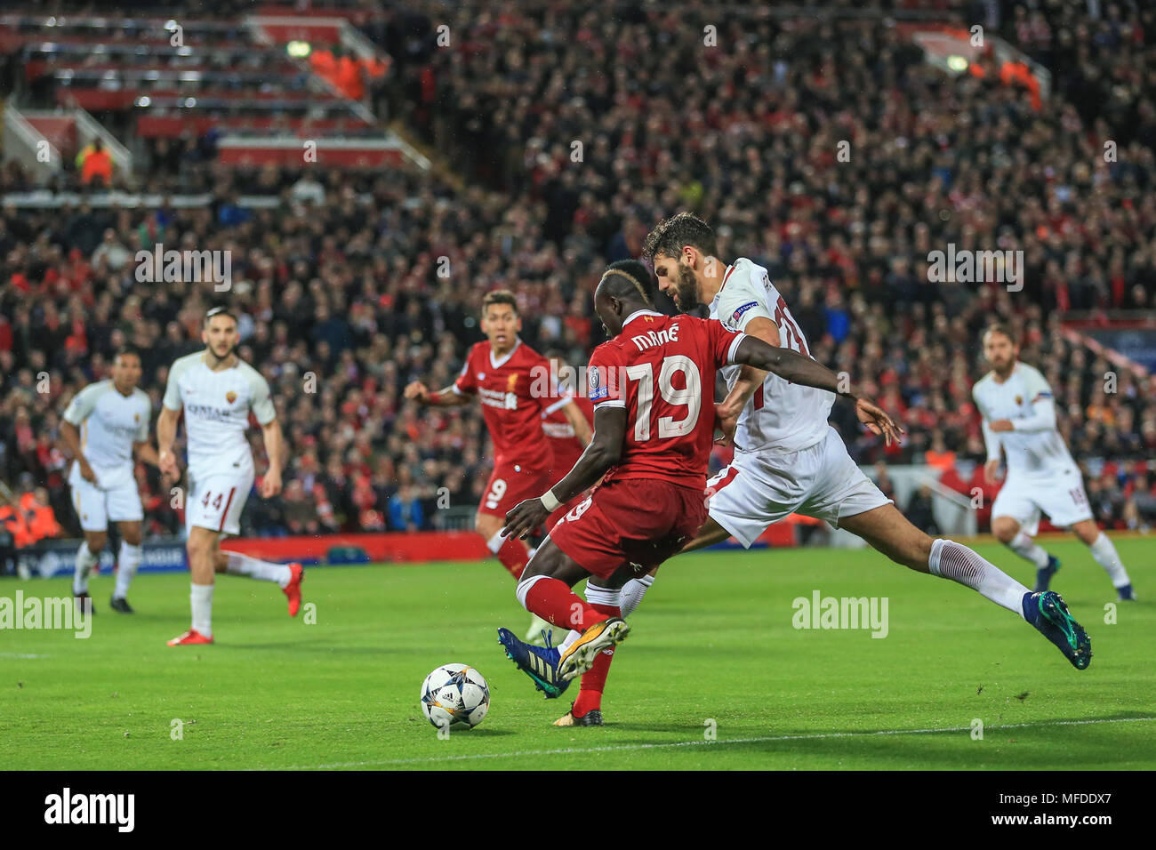 Liverpool, UK. 24th April, 2018. 24th April 2018 , Anfield, Liverpool, England; UAFA Champions League Semi Final, first leg, Liverpool v Roma ; Sadio Mane of Liverpool crosses the ball ah he assists in Roberto Firmino of Liverpool's goal Credit: News Images /Alamy Live News Stock Photo