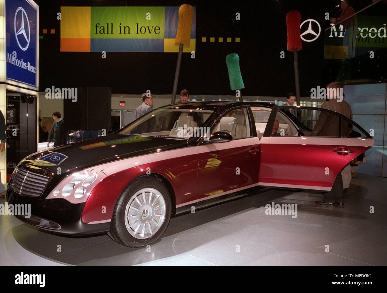The Maybach luxury sedan in deep purple two-tone paint, taken on 6.1.1998 at the Mercedes-Benz booth in Detroit. The decision whether to build the gigantic car in the British retro look, should fall until the end of March. If it is actually released for production, then the car could possibly be built in Sindelfingen. 'Maybach would be an issue for Sindelfingen,' explained Jurgen Hubbert, the management of Daimler-Benz AG responsible for the passenger car sector. The possible 'flagship' of the group has, inter alia, a sophisticated consumer electronics with a large LCD screen, three phones and Stock Photo