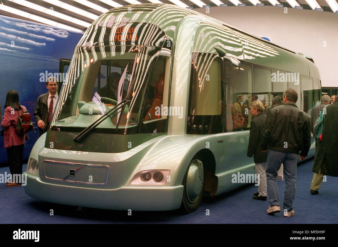 A bus for the future will be presented at the IAA Commercial Vehicles in Hanover until 29.9.1996 by the Swedish exhibitor Volvo. 24.9. Forthcoming is the unusual design of the aluminum body. The driver's seat is in the withte, video cameras instead of rear-view mirrors provide information to the driver. The bus can be lowered to Burgersteighohe. The test prototype is powered by batteries and a gas turbine with integrated high-speed generator. They make about 150 hp. 80 passengers can be brought by bus (of which up to 33 are seated). | usage worldwide Stock Photo