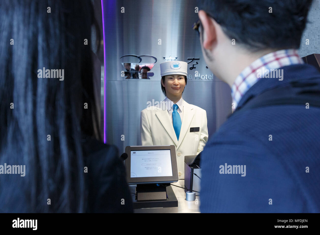 A Humanoid Robot Working At The Front Desk Of Henn Na Hotel