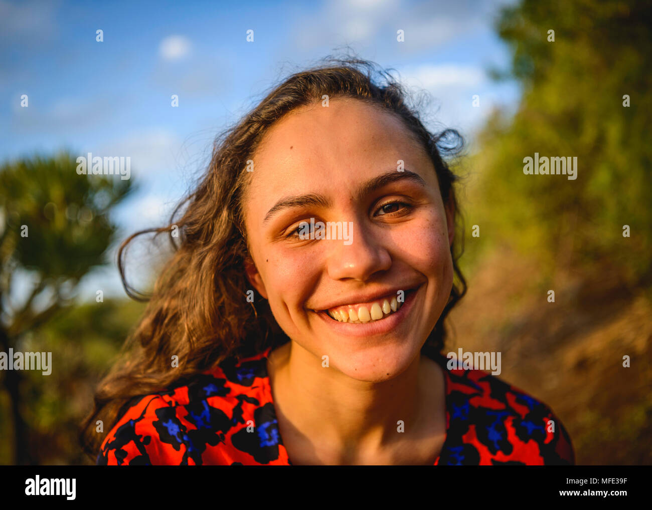 Portrait, young laughing woman, San Cristóbal de La Laguna, Tenerife, Canary Islands, Spain Stock Photo