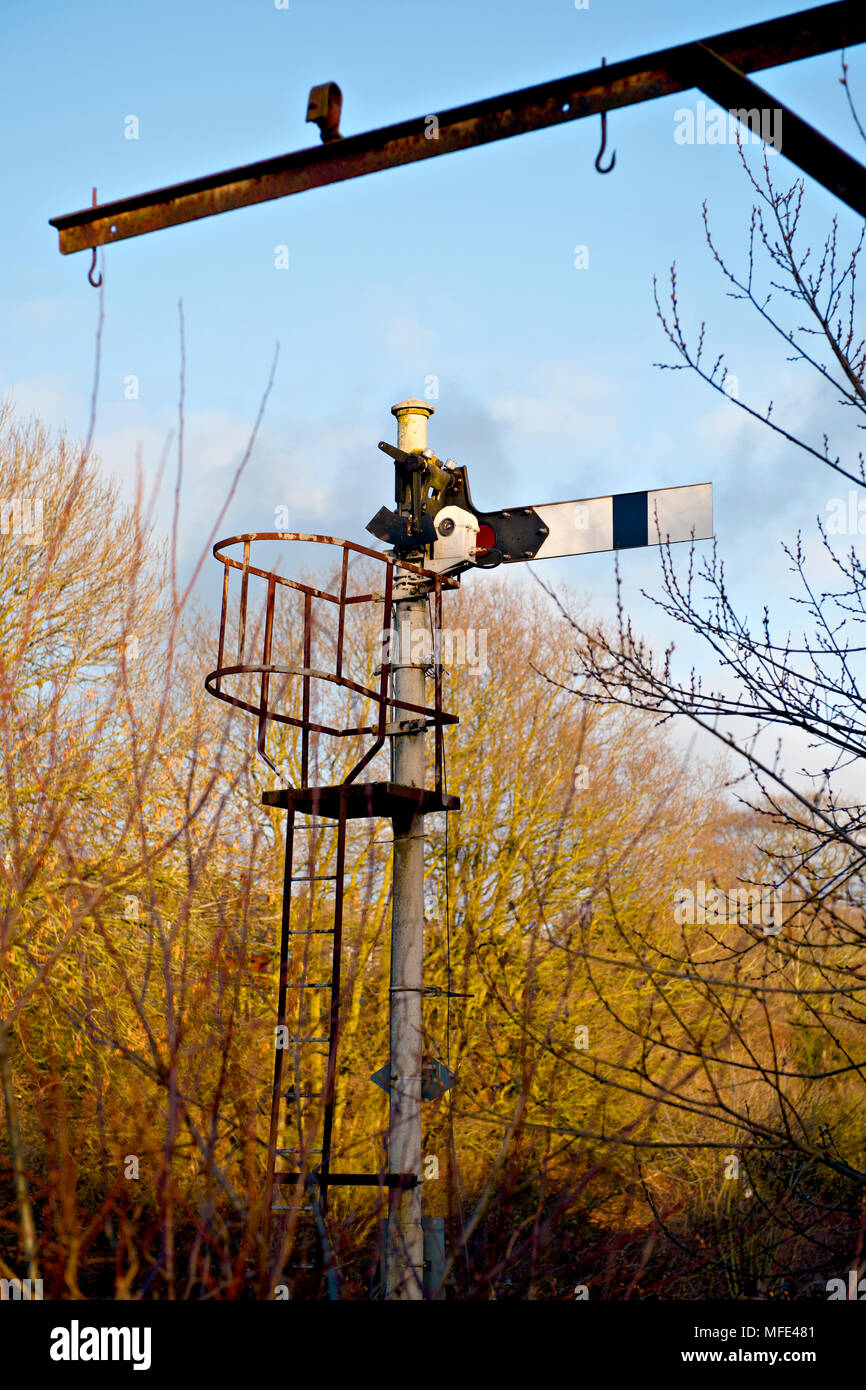 The rear view of a semaphore stop signal at Reedham, Norfolk, prior to replacement by modern colour light signals Stock Photo