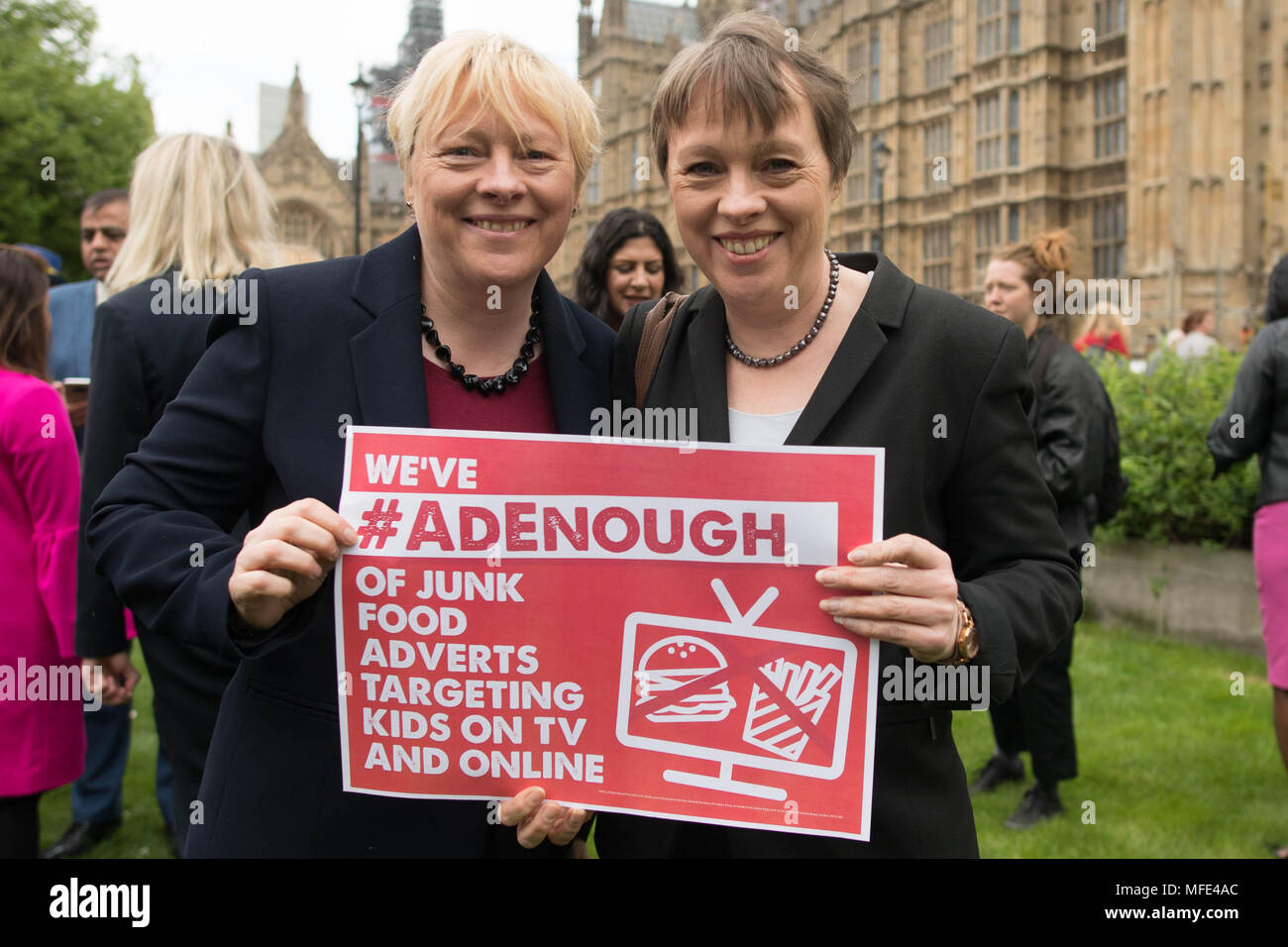 Labour MPs and Peers, including Angela (left) and Maria Eagle, on College Green, London, supporting Jamie Oliver's #Adenough campaign to stop junk food ads before the watershed. Stock Photo