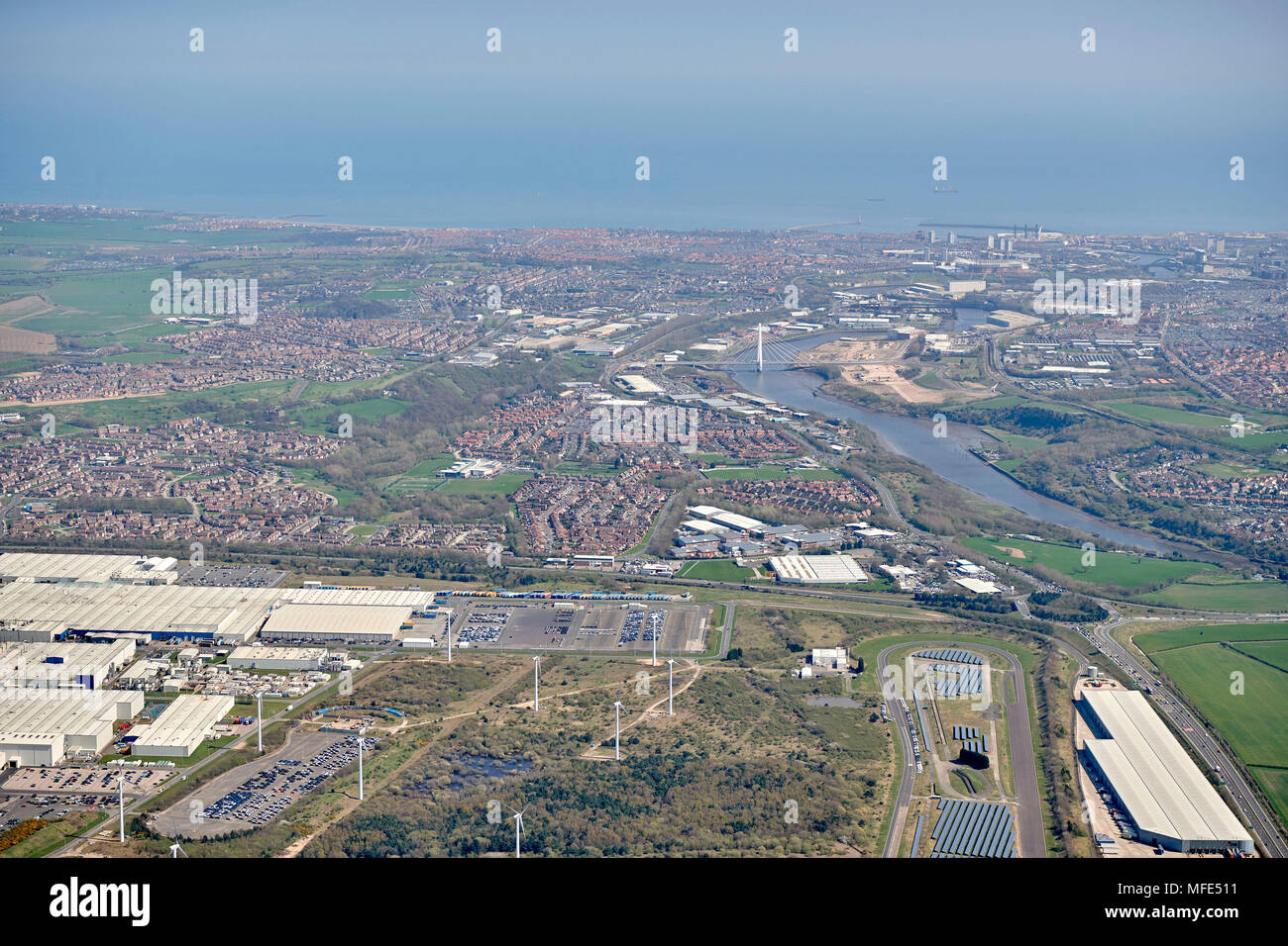 Looking east over the Nisan site at Sunderland, down the river Wear, to the North Sea, North East England, UK Stock Photo