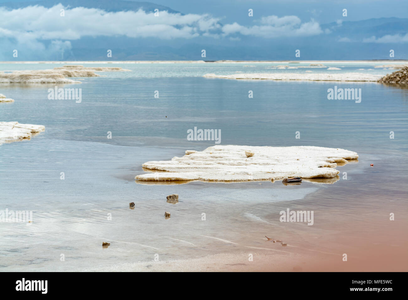 Lowest salty lake in world below sea level Dead sea, full of minerals near luxury vacation resort Ein Bokek, perfect place for medical treatments, cli Stock Photo
