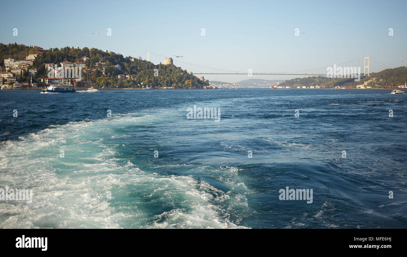 Trail on water surface behind of fast moving motor boat Stock Photo - Alamy