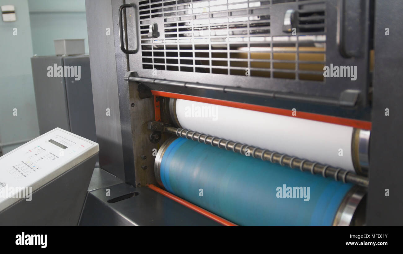 Professional printing machine working in the typography Stock Photo - Alamy