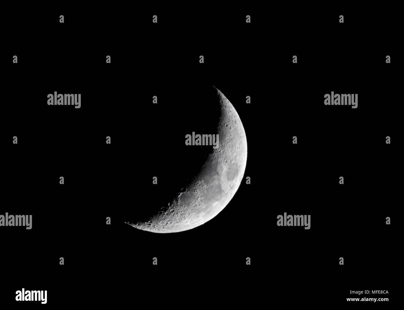 Waxing Cresent Moon, over Helston, Cornwall, UK Stock Photo