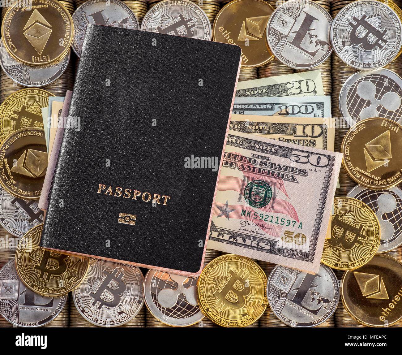 Black passport, metal coins background. US dollars. Metal coins. Gold  silver bitcoin, crypto currency, identification. Security code cold wallet  Stock Photo - Alamy