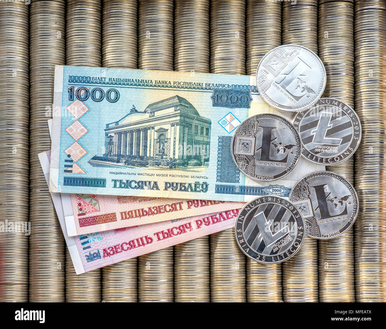 Silver crypto coins Litecoin LTC, paper denominations Belarusian ruble.  Metal coins are laid out in a flat background, close-up view from the top,  cry Stock Photo - Alamy