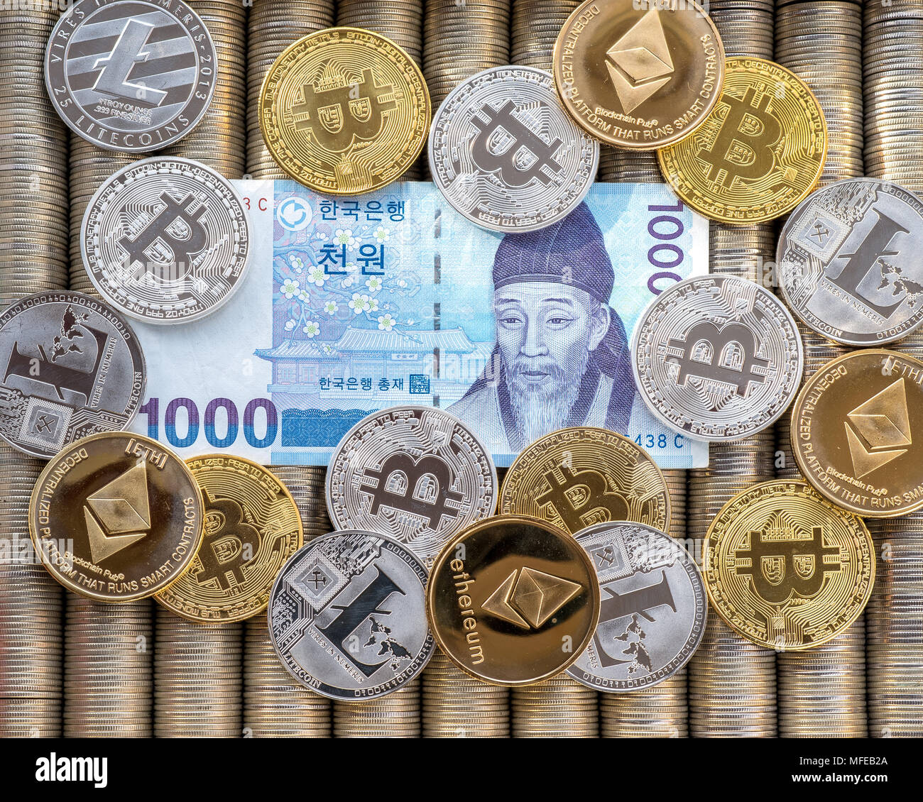 Silver Gold Crypto Coins Ethereum ETH, bitcoin BTC. Paper bills Korean won.  Metal coins are laid out in a smooth background to each other, close-up vi  Stock Photo - Alamy