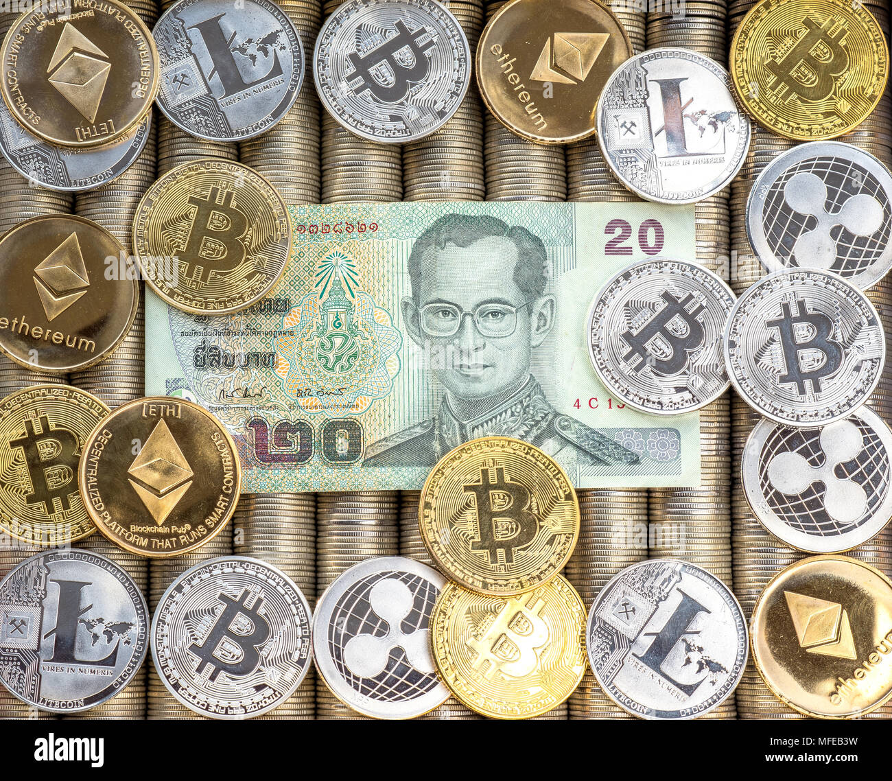 Silver Gold Crypto coins Ethereum ETH, Ripple XRP, Litecoin LTC, bitcoin  BTC. Paper bills Thai baht. Metal coins, close-up view from the top, crypto  c Stock Photo - Alamy