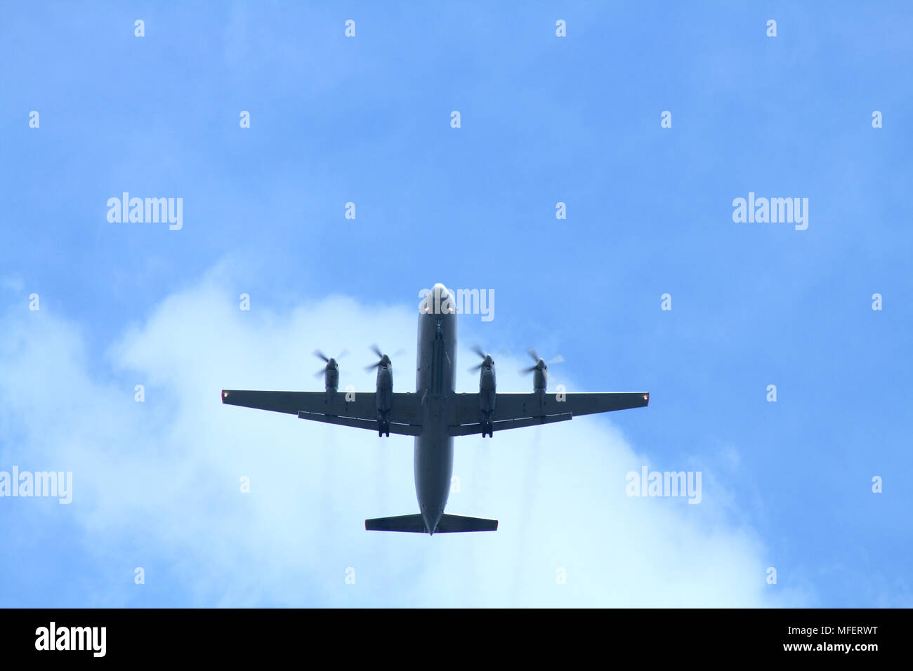 Passenger airplane on background with blue sky and clouds Stock Photo ...