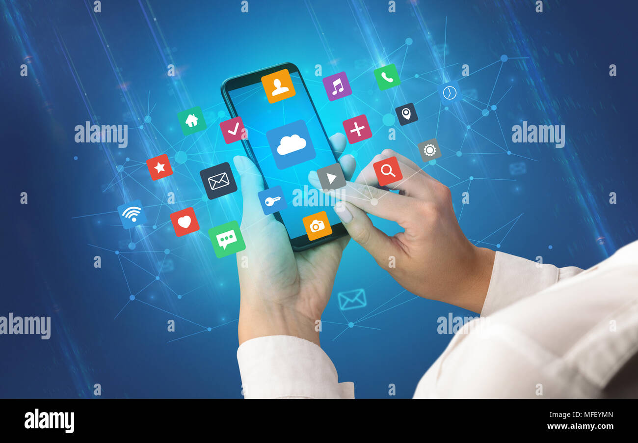Female hand using smartphone with colorful application icons around ...