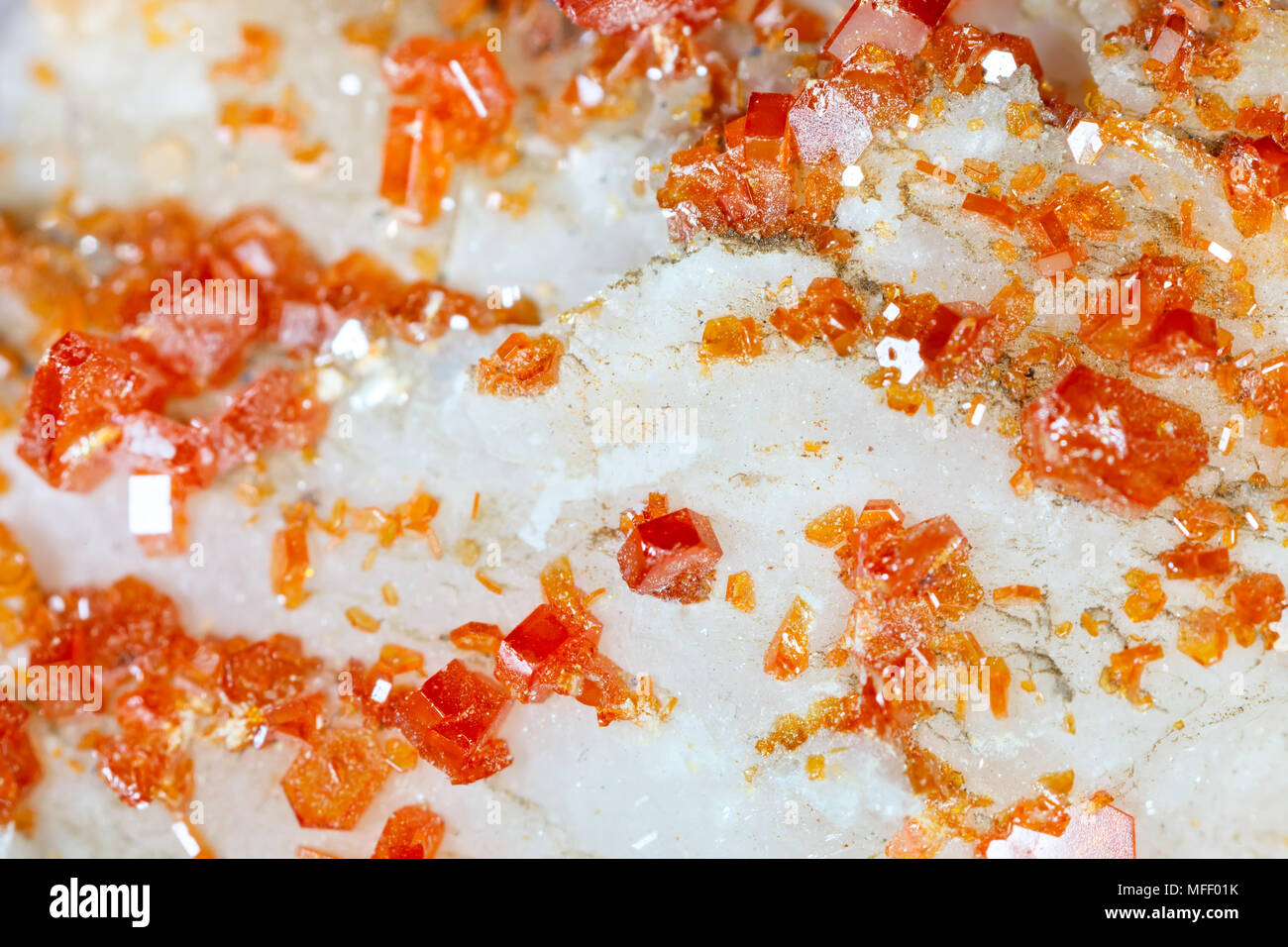 Macro shooting of natural gemstone. Texture of mineral vanadinite. Abstract background. Stock Photo