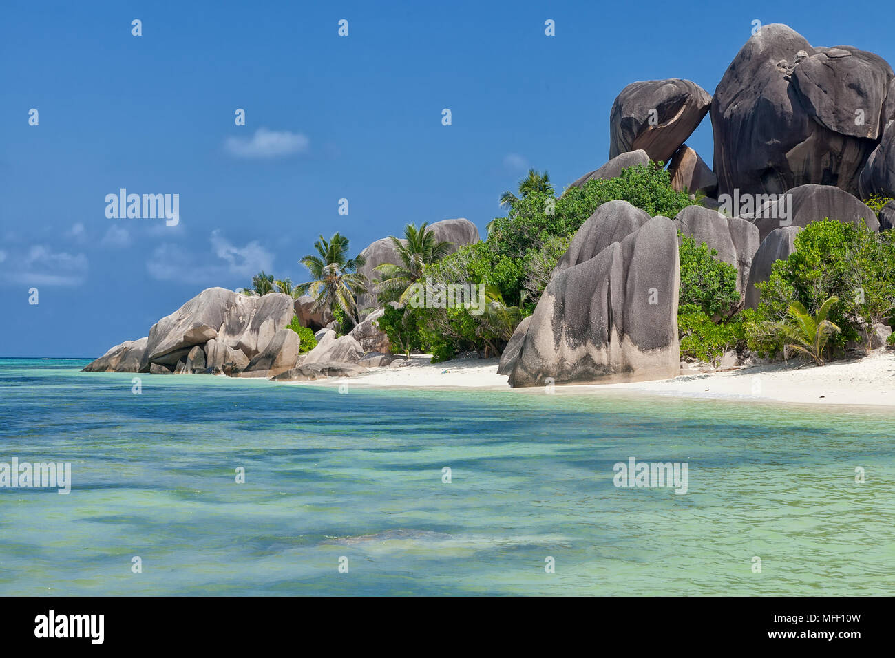 Anse Source d'Argent - granite rocks at beautiful beach on tropical island La Digue in Seychelles Stock Photo
