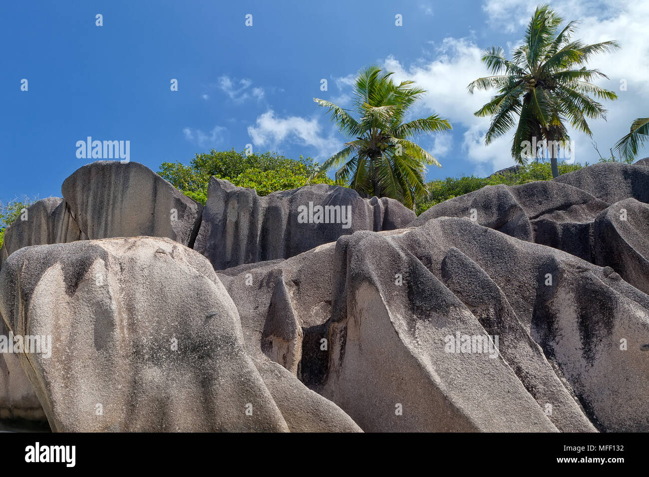 Anse Source d'Argent - granite rocks at beautiful beach on tropical island La Digue in Seychelles Stock Photo