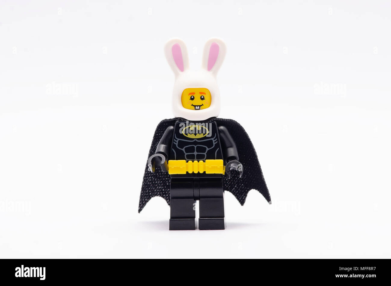 mini figure of batman wearing bunny helmet Lego minifigures are manufactured by The Lego Group Stock Photo Alamy