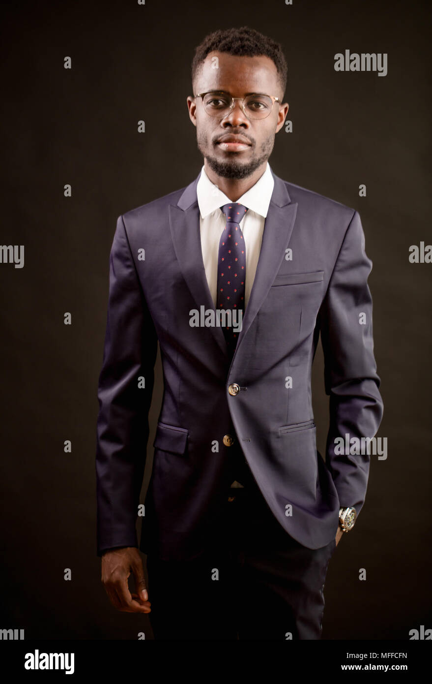Portrait of successful elegant chic man wearing blue suit isolated on ...