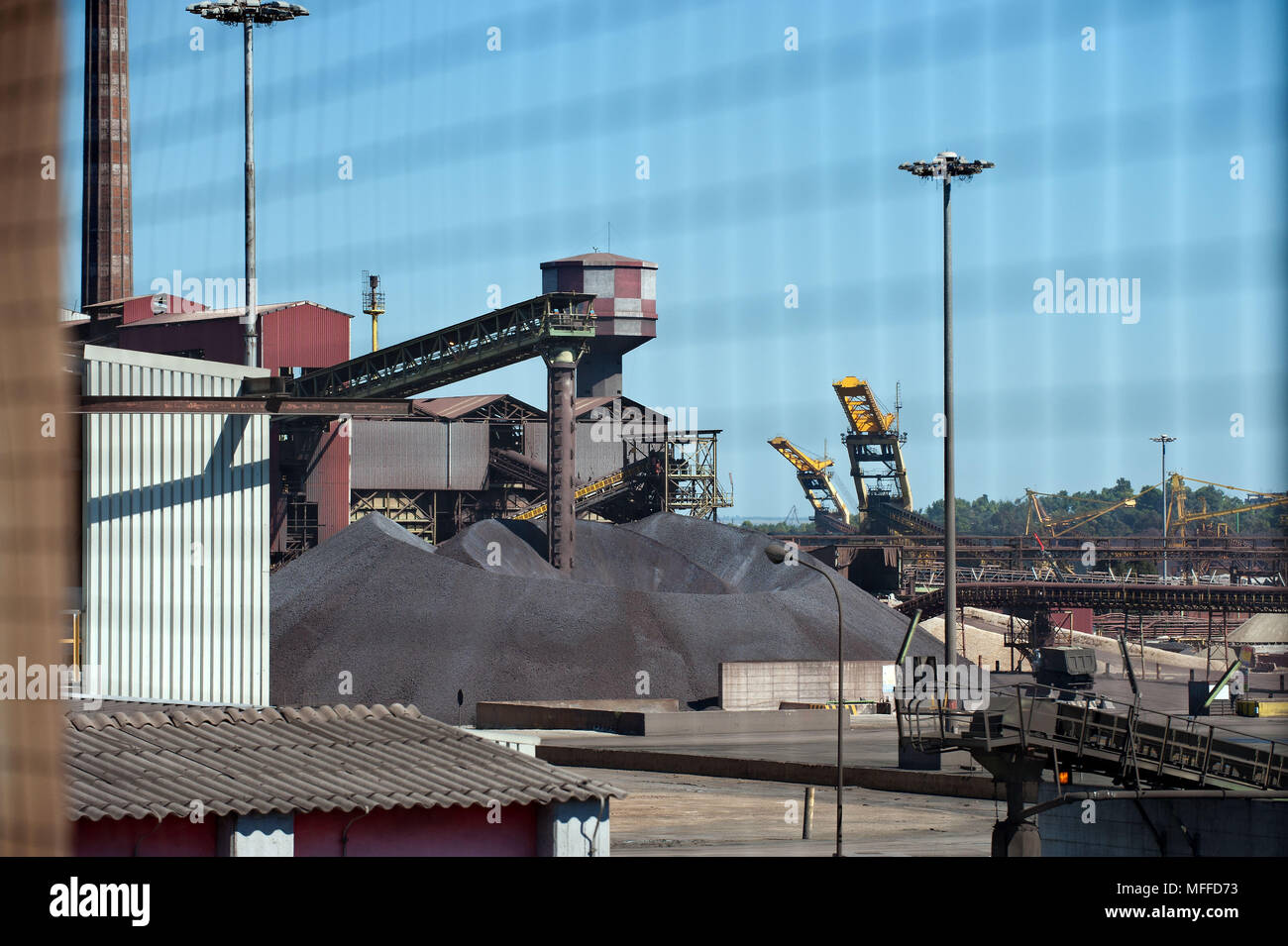 Taranto. ILVA steel factory, mineral site. Italy. Stock Photo