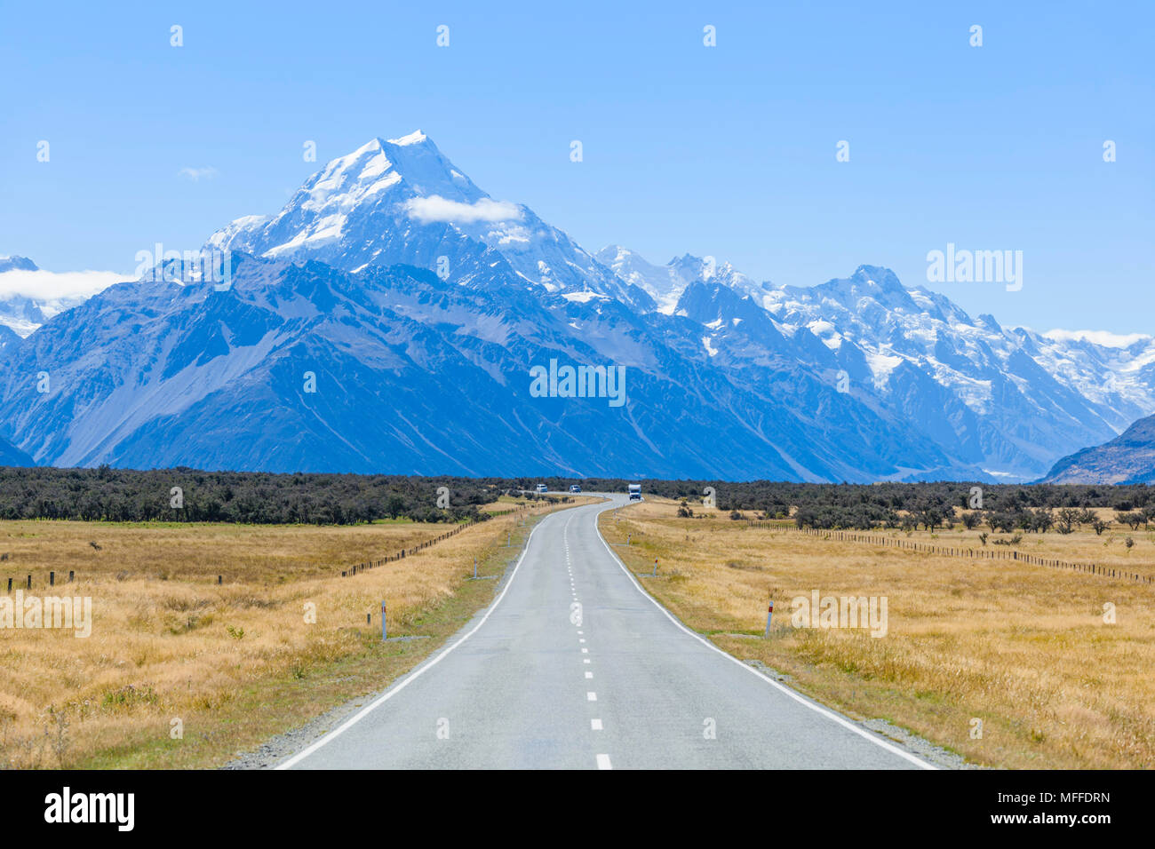 new zealand south island new zealand a straight empty road with no traffic in mount cook national park new zealand Stock Photo