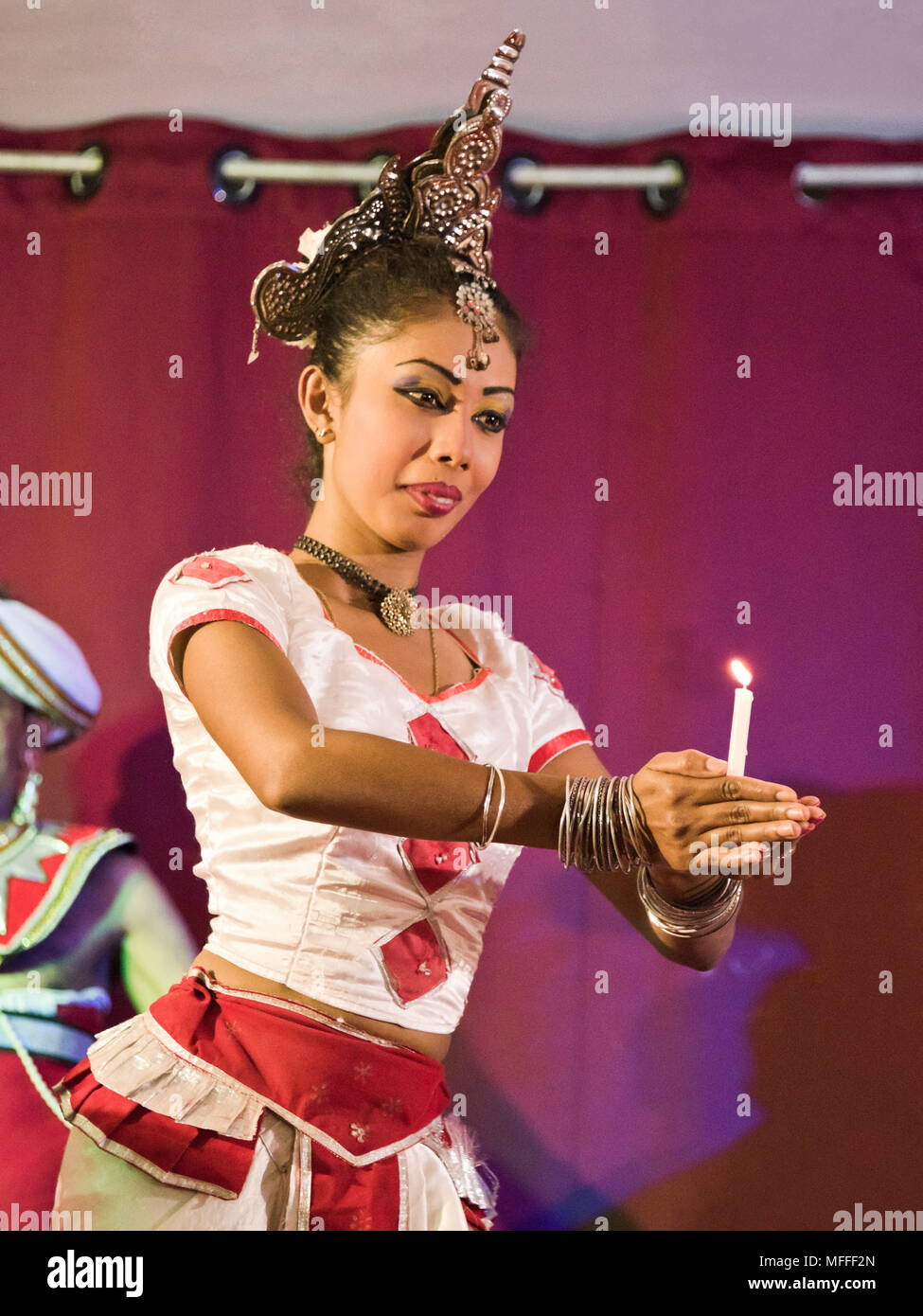 Vertical portrait of a female Kandyan Dancer in Kandy, Sri Lanka. Stock Photo