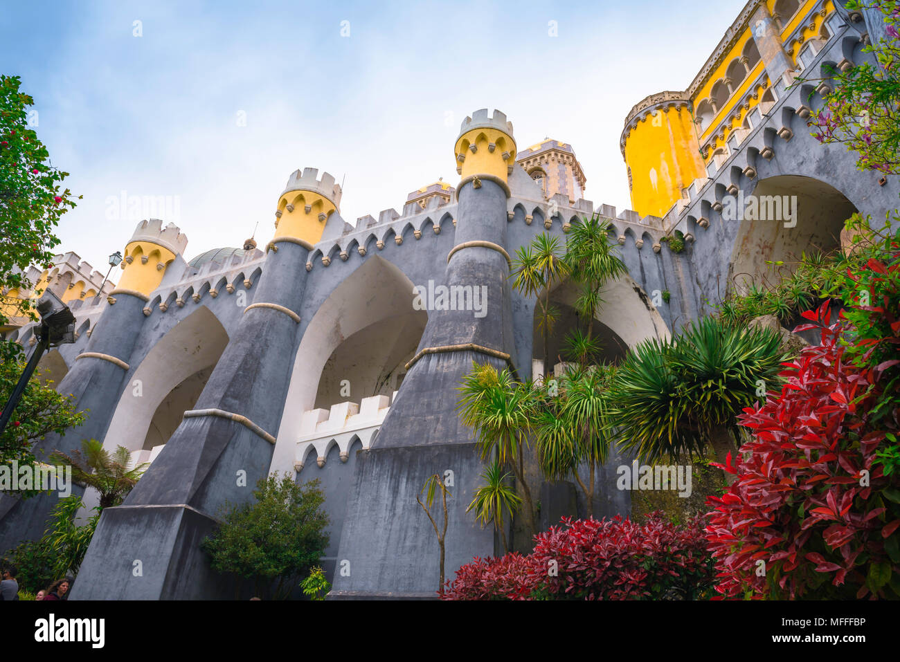 Sintra Portugal, view of the huge ramparts and buttresses supporting the colorful Palacio da Pena in Sintra, Portugal. Stock Photo
