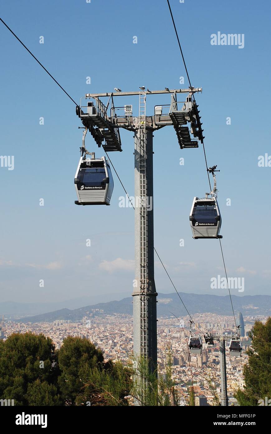 The Teleferic cable car line at Montjuic hill in Barcelona, Spain on April 19, 2018. With 55 cars, the 750 metre route opened in May 2007. Stock Photo