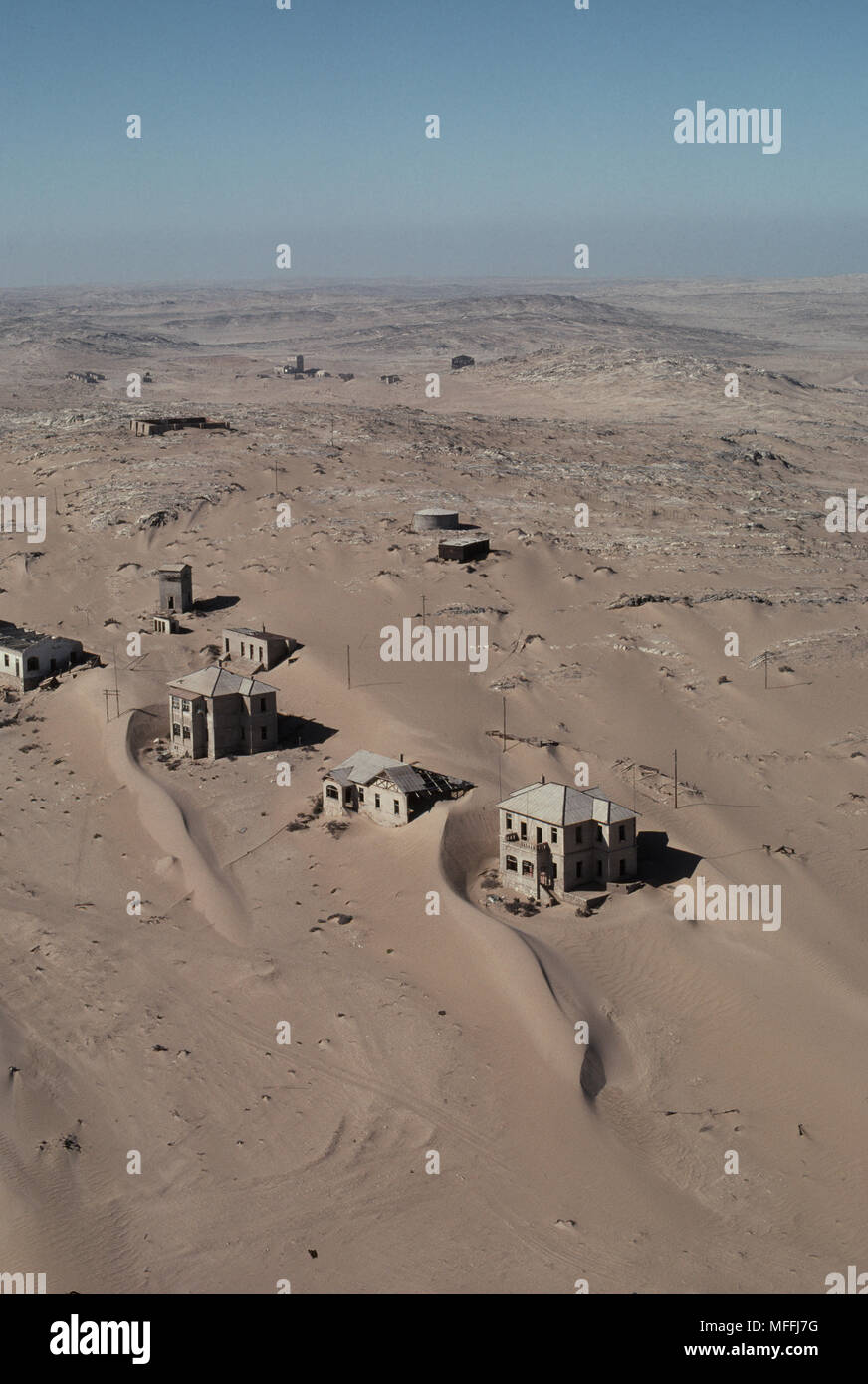 GHOST TOWN OF KOLMAN'S KOP engulfed by sands of Namib Desert, Namibia, SW Africa Stock Photo