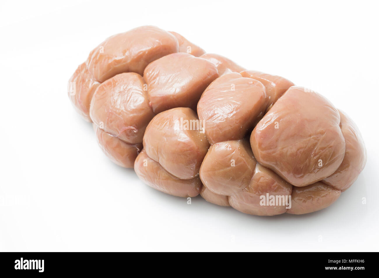 An ox kidney bought from a supermarket in England UK. On a white background. Stock Photo