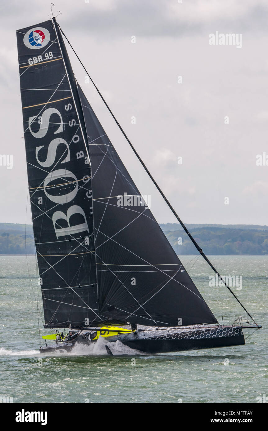 Hugo Boss skippered by Alex Thomson at speed in The Solent off Portsmouth, UK on the 23rd April 2018. Stock Photo