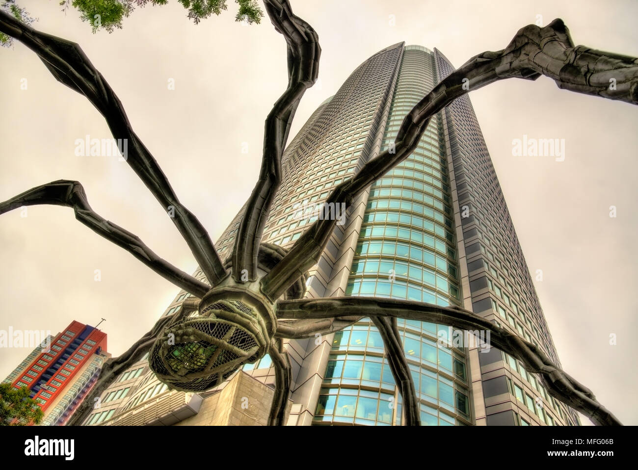 Maman, a spider sculpture, and Mori Tower in Roppongi Hills. Stock Photo