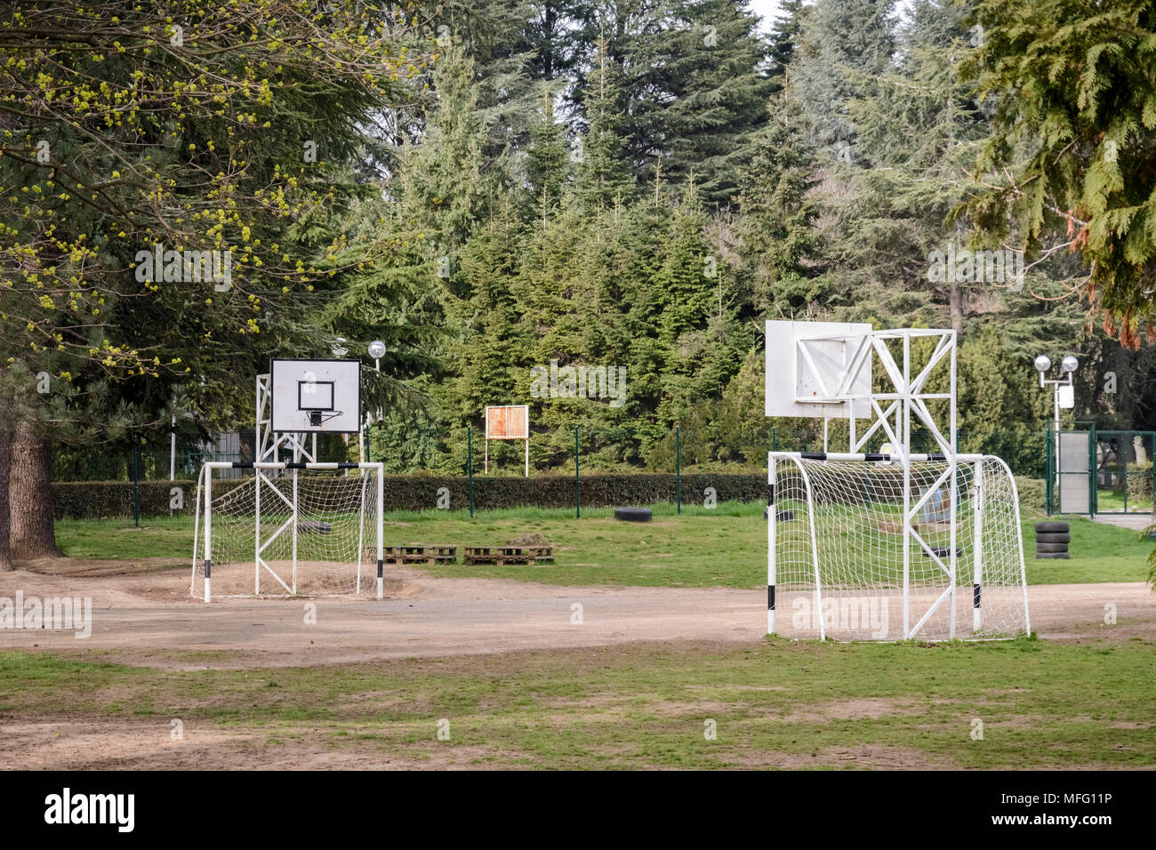 Kids playground in a school, handball net and basket net , surrounded